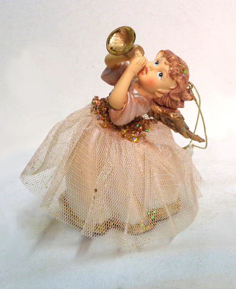 glittery-gold-angel-with-horn-tree