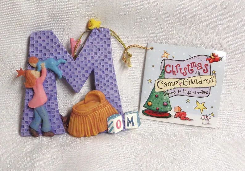 mom-hanging-christmas-tree-ornament-new