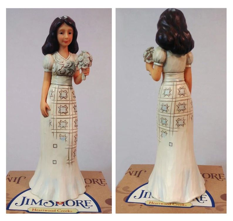 jim-shore-resin-sculpture-sharing-bloom